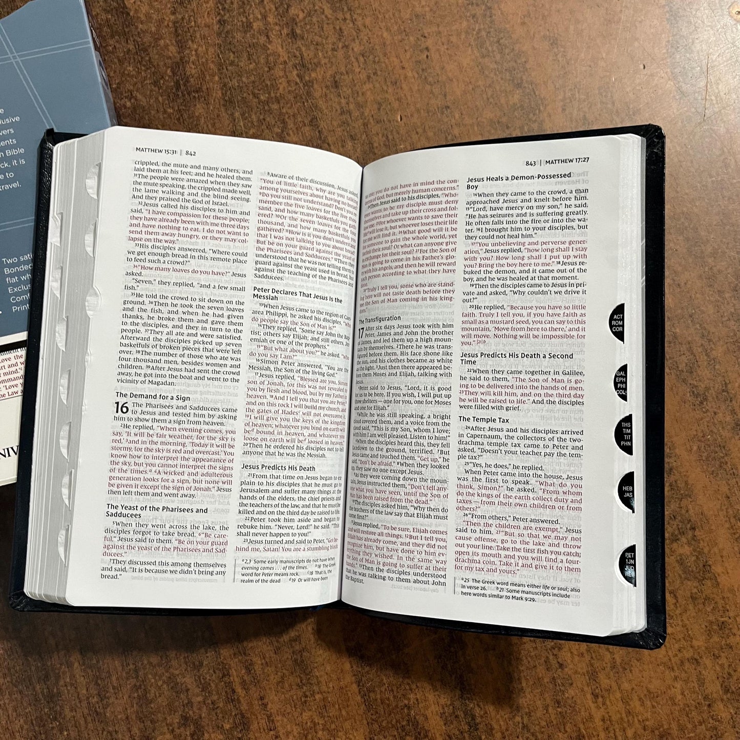Personalized NIV Thinline Bible Thumb Indexed - Navy Bonded Leather, Custom Imprinted with a name, ISBN 9780310448839
