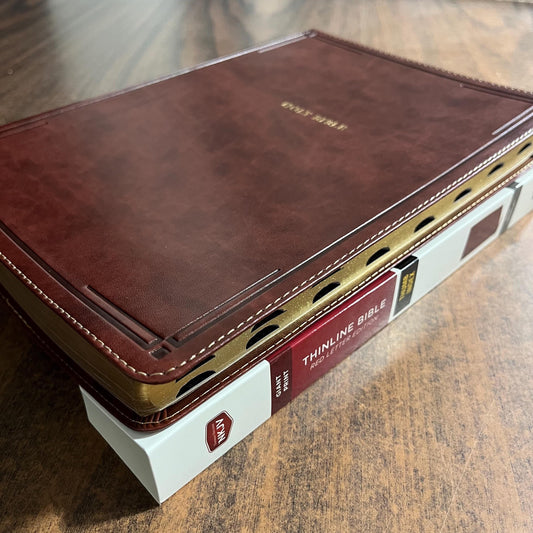 Personalized NKJV Giant Print Thinline Bible Thumb Indexed - Brown Leathersoft - Custom Imprinted with a name isbn 9780785231707