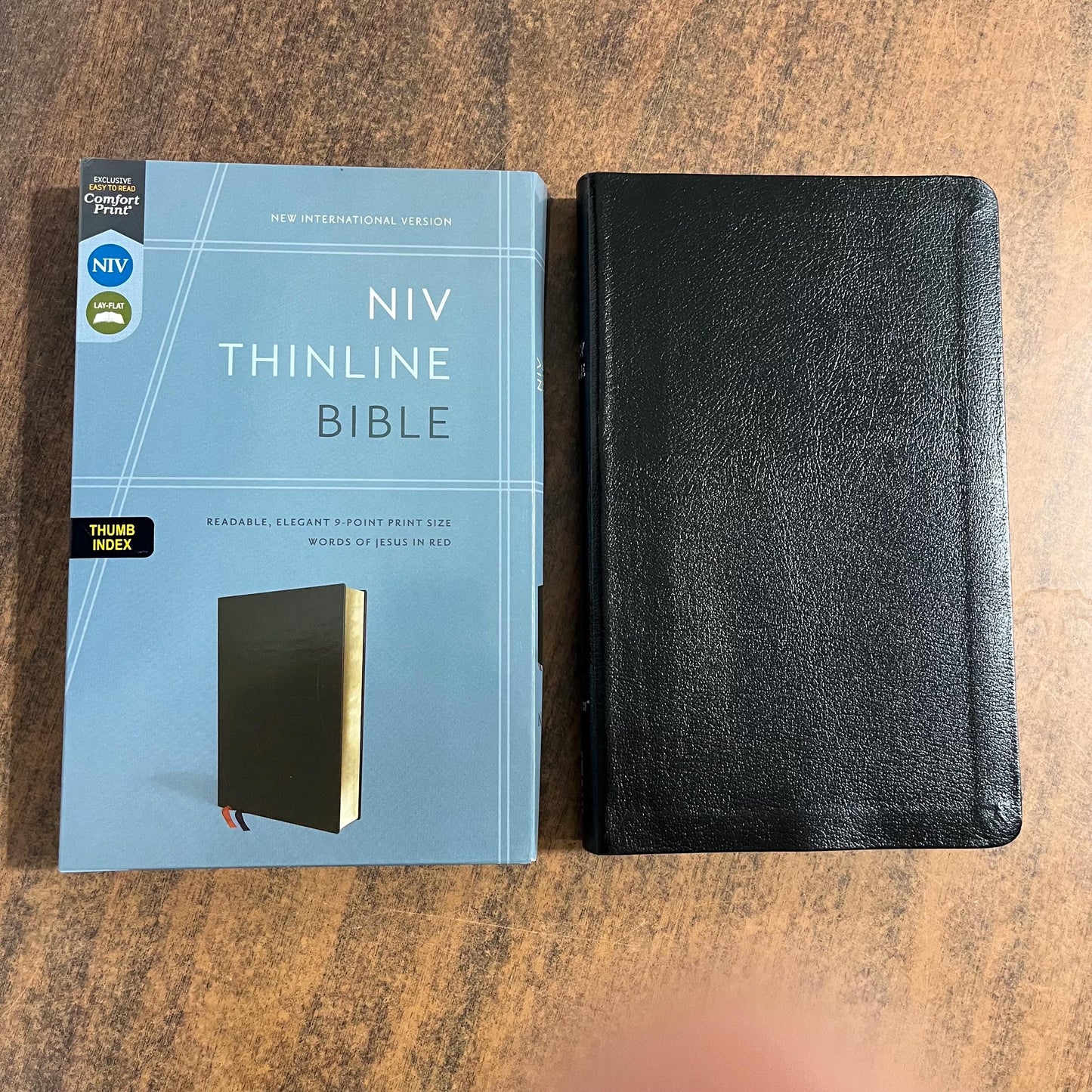 Personalized NIV Thinline Bible Thumb Indexed - Black Bonded Leather, Custom Imprinted with a name, ISBN 9780310448778